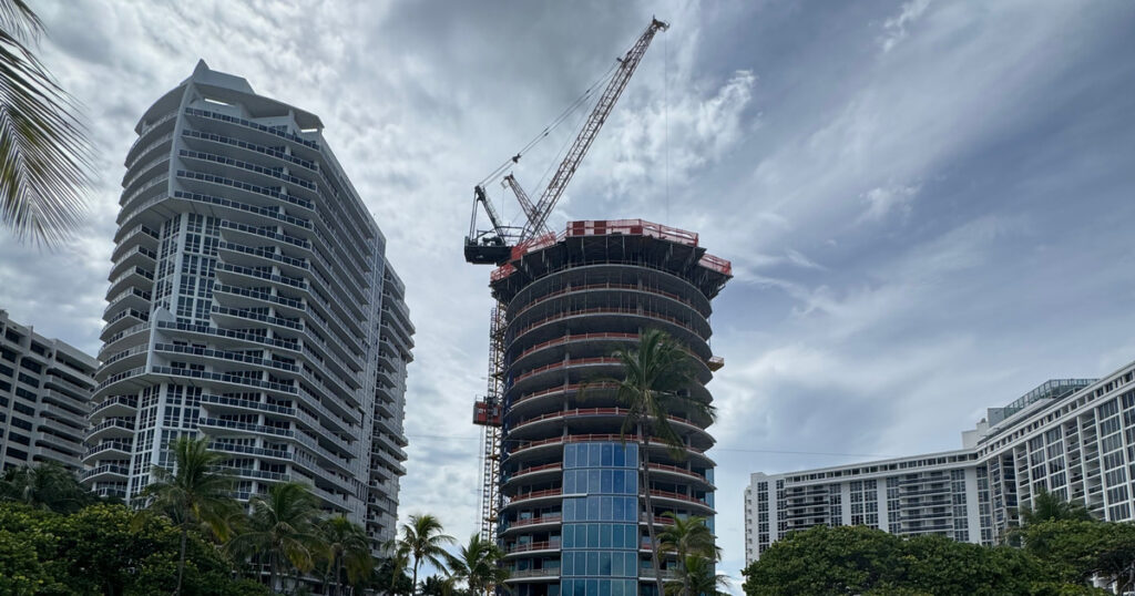 Rivage Bal Harbour under construction between the block's delivered buildings, 10245 Collins Avenue, Bal Harbour, September 22, 2026